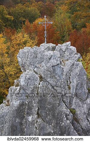 "Summit cross in front of an autumnal forest, Sauerland, Arnsberger Wald, North Rhine-Westphalia, Germany, Europe" View Large Photo Image Stock Photo - "Summit cross in front of an autumnal forest, Sauerland, Arnsberger Wald, North Rhine-Westphalia, Germany, Europe". Fotosearch