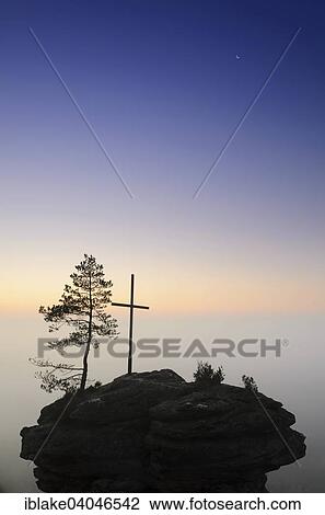 "Summit cross of Mt Rotzenberg before sunrise, ground fog, Palatinate Forest, Rhineland-Palatinate, Germany, Europe" View Large Photo Image Stock Image - "Summit cross of Mt Rotzenberg before sunrise, ground fog, Palatinate Forest, Rhineland-Palatinate, Germany, Europe". Fotosearch