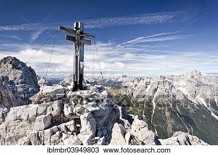 "Summit cross of the Croda Rossa di Sesto, behind the Dreischusterspitze, below the Altsteintal, Dolomites, Sexten, Alta Pusteria valley, Province of South Tyrol, Trentino-Alto Adige, Italy, Europe" View Large Photo Image Stock Image - "Summit cross of the Croda Rossa di Sesto, behind the Dreischusterspitze, below the Altsteintal, Dolomites, Sexten, Alta Pusteria valley, Province of South Tyrol, Trentino-Alto Adige, Italy, Europe". Fotosearch