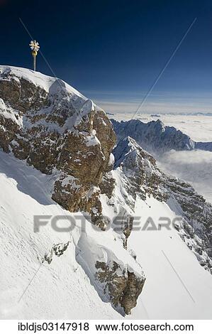 "Summit cross of Zugspitze Mountain, Zugspitze, Wetterstein mountain range, Eastern Alps, Upper Bavaria, Bavaria, Germany, Europe" View Large Photo Image Stock Photo - "Summit cross of Zugspitze Mountain, Zugspitze, Wetterstein mountain range, Eastern Alps, Upper Bavaria, Bavaria, Germany, Europe". Fotosearch