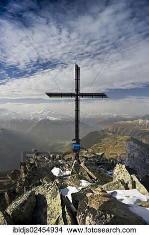 "Summit cross on Bettmerhorn Mountain, overlooking the Rhone Valley and the Pennine Alps, Bettmeralp, Valais, Switzerland, Europe" View Large Photo Image Picture - "Summit cross on Bettmerhorn Mountain, overlooking the Rhone Valley and the Pennine Alps, Bettmeralp, Valais, Switzerland, Europe". Fotosearch