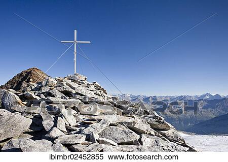 "Summit cross on Fernerkoepfl Mountain in the Rieserferner Group of Puster Valley, looking towards Schneebige Nock Mountain, Alto Adige, Italy, Europe" View Large Photo Image Stock Photography - "Summit cross on Fernerkoepfl Mountain in the Rieserferner Group of Puster Valley, looking towards Schneebige Nock Mountain, Alto Adige, Italy, Europe". Fotosearch