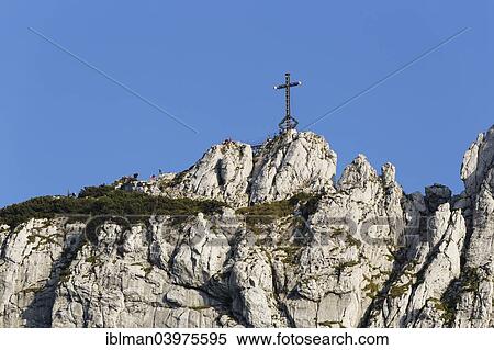"Summit cross on the east peak, Kampenwand, Aschau im Chiemgau, Chiemgau Alps, Upper Bavaria, Bavaria, Germany, Europe" View Large Photo Image Stock Photography - "Summit cross on the east peak, Kampenwand, Aschau im Chiemgau, Chiemgau Alps, Upper Bavaria, Bavaria, Germany, Europe". Fotosearch