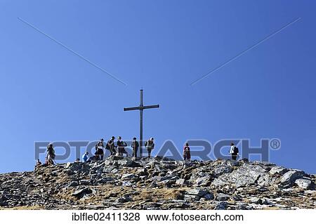 "Summit cross on Zirbitzkogel mountain, Seetal Alps, Styria, Austria, Europe" View Large Photo Image Stock Photo - "Summit cross on Zirbitzkogel mountain, Seetal Alps, Styria, Austria, Europe". Fotosearch