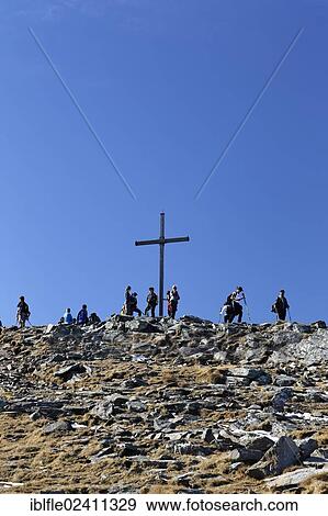 "Summit cross on Zirbitzkogel mountain, Seetal Alps, Styria, Austria, Europe" View Large Photo Image Stock Photo - "Summit cross on Zirbitzkogel mountain, Seetal Alps, Styria, Austria, Europe". Fotosearch