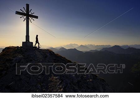 "Summit cross with backlighting, Geisshorn Mountain, Tannheim Valley, Tyrol, Austria, Europe" View Large Photo Image Picture - "Summit cross with backlighting, Geisshorn Mountain, Tannheim Valley, Tyrol, Austria, Europe". Fotosearch