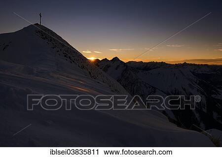 Stock Image - "Summit of Mt Bleispitze at sunset, Berwang, Ausserfern, Tyrol, Austria, Europe". Fotosearch