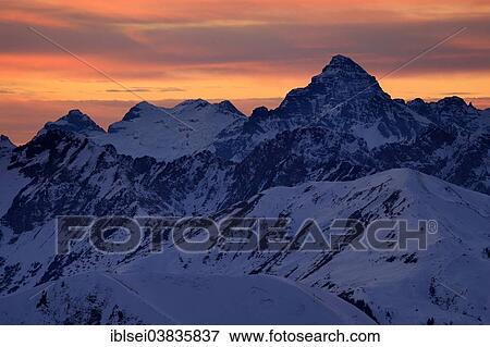 "Summit of Mt Hochvogel with the Allgau Alps at sunset, Berwang, Ausserfern, Tyrol, Austria, Europe" View Large Photo Image Stock Photo - "Summit of Mt Hochvogel with the Allgau Alps at sunset, Berwang, Ausserfern, Tyrol, Austria, Europe". Fotosearch