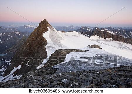 Stock Photography - "Summit of Zuckerhuetl Mountain at dawn, Stubai Valley, Stubai Alps, Tyrol, Austria, Europe". Fotosearch