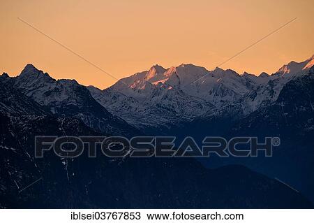 "Sun rise over the mountains, Ehrwald, Tyrol, Austria, Europe" View Large Photo Image Stock Image - "Sun rise over the mountains, Ehrwald, Tyrol, Austria, Europe". Fotosearch