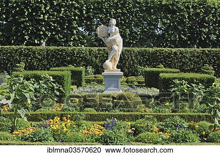 "Sun"""" statue in a Low-German flower garden, large garden, Hannover, Lower Saxony, Germany, Europe" View Large Photo Image Stock Image - "Sun"""" statue in a Low-German flower garden, large garden, Hannover, Lower Saxony, Germany, Europe". Fotosearch