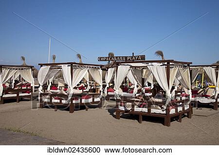 Stock Image - "Sunbeds on the Copacabana Playa beach, Torremolinos, Malaga province, Costa del Sol, Andalusia, Spain, Europe, PublicGround, Europe". Fotosearch