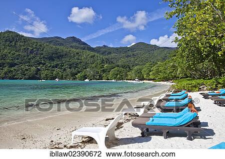"Sunloungers on the beach of the Ephelia Resort at Port Launay Marine National Park, Mahe Island, Seychelles, Africa, Indian Ocean, Africa" View Large Photo Image Stock Image - "Sunloungers on the beach of the Ephelia Resort at Port Launay Marine National Park, Mahe Island, Seychelles, Africa, Indian Ocean, Africa". Fotosearch