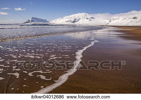 "Sunny winter day on the sandy beach in front of Snaefellsjokull volcano, Snaefellsnes Peninsula, Iceland, Europe" View Large Photo Image Stock Photograph - "Sunny winter day on the sandy beach in front of Snaefellsjokull volcano, Snaefellsnes Peninsula, Iceland, Europe". Fotosearch