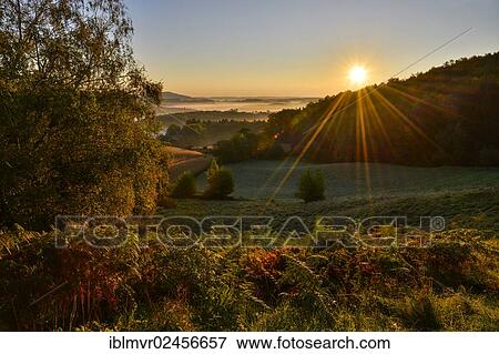 "Sunrays in autumn, Kulm, Eastern Styrian hill country, Austria, Europe" View Large Photo Image Stock Photo - "Sunrays in autumn, Kulm, Eastern Styrian hill country, Austria, Europe". Fotosearch