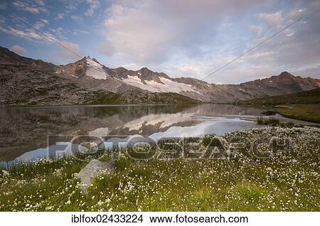 "Sunrise at Oberer Wildgerlos-See lake, Zillertal Alps, Austria, Europe" View Large Photo Image Picture - "Sunrise at Oberer Wildgerlos-See lake, Zillertal Alps, Austria, Europe". Fotosearch