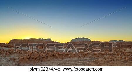 Stock Photography - "Sunrise, eroded entrada sandstone hoodoos and rock formations, Goblins, Goblin Valley State Park, San Rafael Reef Desert, Utah, Southwestern USA, USA". Fotosearch