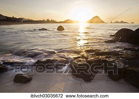 "Sunrise on the coast of Lombok, Kuta Lombok, Lombok island, Nusa Tenggara Barat Province, Indonesia, Asia" View Large Photo Image Stock Image - "Sunrise on the coast of Lombok, Kuta Lombok, Lombok island, Nusa Tenggara Barat Province, Indonesia, Asia". Fotosearch