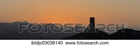 "Sunrise over Al-Mudayrib with the silhouette of a lone watch tower, Ash Sharqiyah, Oman, Asia" View Large Photo Image Stock Image - "Sunrise over Al-Mudayrib with the silhouette of a lone watch tower, Ash Sharqiyah, Oman, Asia". Fotosearch