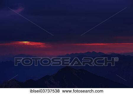 "Sunrise over the Ammer Mountains with a dramatic sky, Ammergau Alps, Reutte, Reutte District, Tyrol, Austria, Europe" View Large Photo Image Stock Photo - "Sunrise over the Ammer Mountains with a dramatic sky, Ammergau Alps, Reutte, Reutte District, Tyrol, Austria, Europe". Fotosearch