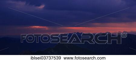 "Sunrise over the Ammer Mountains with a dramatic sky, Ammergau Alps, Reutte, Reutte District, Tyrol, Austria, Europe" View Large Photo Image Stock Photo - "Sunrise over the Ammer Mountains with a dramatic sky, Ammergau Alps, Reutte, Reutte District, Tyrol, Austria, Europe". Fotosearch