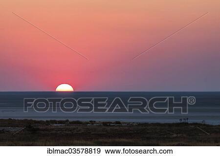 "Sunrise over the Etosha Pan, Etosha National Park, Namibia, Africa" View Large Photo Image Stock Photo - "Sunrise over the Etosha Pan, Etosha National Park, Namibia, Africa". Fotosearch