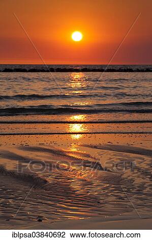 Stock Image - "Sunrise, Rugen, Baltic Sea, Mecklenburg-Western Pomerania, Germany, Europe". Fotosearch