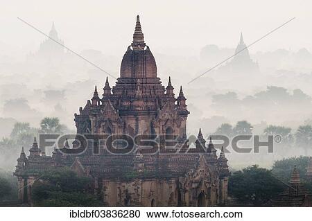 "Sunrise, temples in the morning mist, stupas and pagodas in the temple complex of the Plateau of Bagan, Mandalay Division, Myanmar or Burma" View Large Photo Image Stock Image - "Sunrise, temples in the morning mist, stupas and pagodas in the temple complex of the Plateau of Bagan, Mandalay Division, Myanmar or Burma". Fotosearch