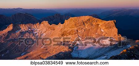 "Sunrise view from Mt Zugspitze to Mt Schneefernerkopf, towards Tyrol, Zugspitzplatt, high karst plateau, Wetterstein Range, Werdenfelser Land, Upper Bavaria, Bavaria, Germany, Europe" View Large Photo Image Stock Photo - "Sunrise view from Mt Zugspitze to Mt Schneefernerkopf, towards Tyrol, Zugspitzplatt, high karst plateau, Wetterstein Range, Werdenfelser Land, Upper Bavaria, Bavaria, Germany, Europe". Fotosearch