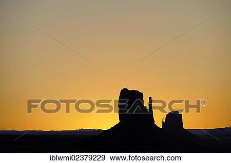 Stock Photo - "Sunrise with the mesas of West Mitten Butte and East Mitten Butte, Monument Valley, Navajo Tribal Park, Navajo Nation Reservation, Arizona, Utah, Southwest, United States of America, USA". Fotosearch