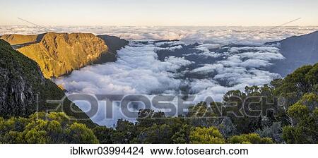 "Sunset above sea of? Çï? Çïclouds at Cilaos basin, Cirque de Cilaos, Cilaos, Reunion, Africa" View Large Photo Image Picture - "Sunset above sea of? Çï? Çïclouds at Cilaos basin, Cirque de Cilaos, Cilaos, Reunion, Africa". Fotosearch