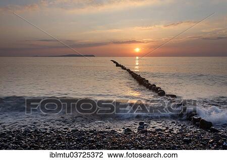 "Sunset at Bug on Ruegen island, Hiddensee island at back, Bug, Dranske, Rugen, Mecklenburg-Western Pomerania, Germany, Europe" View Large Photo Image Stock Image - "Sunset at Bug on Ruegen island, Hiddensee island at back, Bug, Dranske, Rugen, Mecklenburg-Western Pomerania, Germany, Europe". Fotosearch