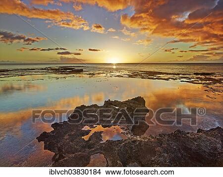 Picture - "Sunset at Ka'ena Point State Park, Oahu, Hawaii, United States, North America". Fotosearch