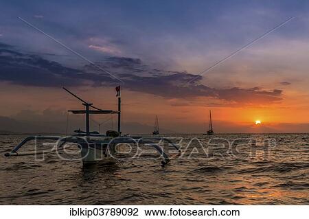 "Sunset at Lovina Beach, northwestern Bali, Bali, Indonesia, Asia" View Large Photo Image Stock Image - "Sunset at Lovina Beach, northwestern Bali, Bali, Indonesia, Asia". Fotosearch