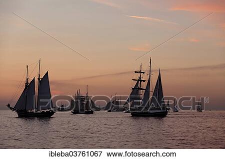 "Sunset at the Hanse Sail 2013, Baltic Sea near the entrance to the port, Warnemunde, Rostock, Mecklenburg-Western Pomerania, Germany, Europe" View Large Photo Image Stock Photo - "Sunset at the Hanse Sail 2013, Baltic Sea near the entrance to the port, Warnemunde, Rostock, Mecklenburg-Western Pomerania, Germany, Europe". Fotosearch
