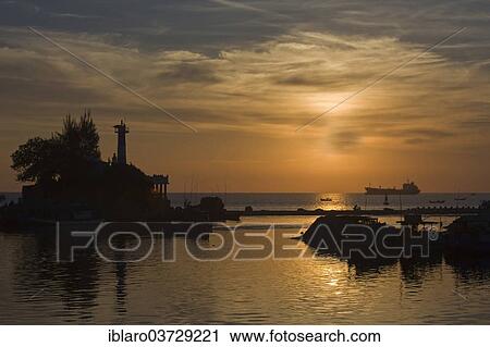 "Sunset at the harbour entrance of Phu Quốc, Phu Quốc, Vietnam, Asia" View Large Photo Image Stock Image - "Sunset at the harbour entrance of Phu Quốc, Phu Quốc, Vietnam, Asia". Fotosearch