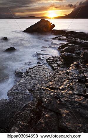 Stock Photo - "Sunset at the rocky coast, Elgol, Isle of Skye, Scotland, United Kingdom, Europe". Fotosearch