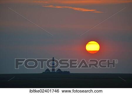 "Sunset behind the Westerheversand Lighthouse, Westerhever, North Frisia, Schleswig-Holstein, northern Germany, Germany, Europe" View Large Photo Image Stock Photograph - "Sunset behind the Westerheversand Lighthouse, Westerhever, North Frisia, Schleswig-Holstein, northern Germany, Germany, Europe". Fotosearch