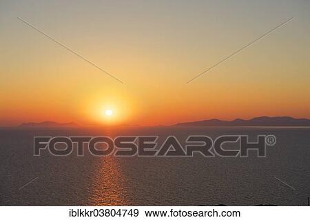 Stock Photo - "Sunset in Oia, Santorini, Cyclades, Greece, Europe". Fotosearch