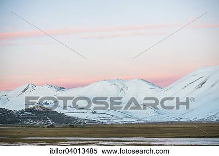 "Sunset in winter, Monti Sibillini National Park, Castelluccio di Norcia, Umbria, Italy, Europe" View Large Photo Image Stock Photography - "Sunset in winter, Monti Sibillini National Park, Castelluccio di Norcia, Umbria, Italy, Europe". Fotosearch
