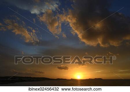 Stock Image - "Sunset near Sant Antoni, Ibiza, Pitiusic Islands or Pine Islands, Balearic Islands, Spain, Europe". Fotosearch