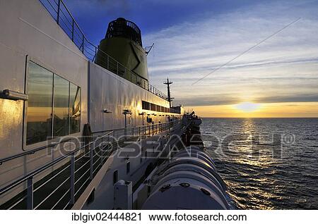 Sunset on a ferry in the Mediterranean Sea View Large Photo Image Stock Image - Sunset on a ferry in the Mediterranean Sea. Fotosearch