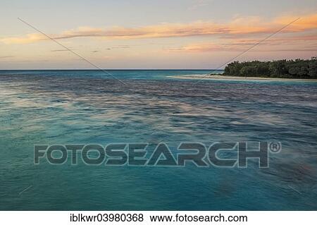 "Sunset on Mouli Beach, Ouvea, New Caledonia, Oceania" View Large Photo Image Stock Photo - "Sunset on Mouli Beach, Ouvea, New Caledonia, Oceania". Fotosearch