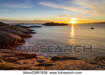 "Sunset on the coast, near Henningsvaer, Austvagoy or Austvagoya, Lofoten, Norway, Europe" View Large Photo Image Stock Photo - "Sunset on the coast, near Henningsvaer, Austvagoy or Austvagoya, Lofoten, Norway, Europe". Fotosearch
