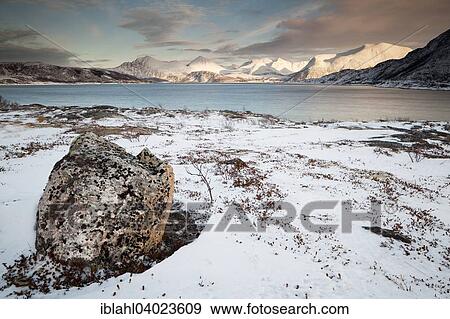 Stock Photo - "Sunset on the Nordfjord in Sommeroy, Kvaloya, Tromvik, Troms, Norway, Europe". Fotosearch
