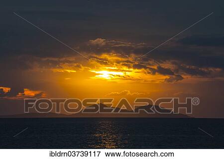 "Sunset on the west coast of Flores Island, Komodo, Nusa Tenggara Timur, Indonesia, Asia" View Large Photo Image Stock Photo - "Sunset on the west coast of Flores Island, Komodo, Nusa Tenggara Timur, Indonesia, Asia". Fotosearch