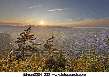 "Sunset over Dornbirn seen from Karren mountain, Lake Constance at the back, Dornbirn, Vorarlberg, Rhine Valley, Austria, Europe" View Large Photo Image Stock Image - "Sunset over Dornbirn seen from Karren mountain, Lake Constance at the back, Dornbirn, Vorarlberg, Rhine Valley, Austria, Europe". Fotosearch