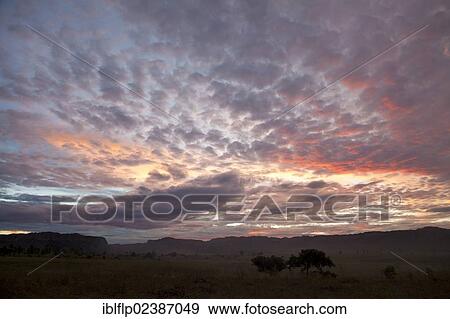 "Sunset over grassland habitat, Isalo National Park, Ihorombe Region, Madagascar, Africa" View Large Photo Image Stock Photo - "Sunset over grassland habitat, Isalo National Park, Ihorombe Region, Madagascar, Africa". Fotosearch
