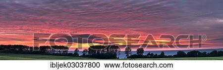Stock Image - "Sunset over the Baltic Sea, Rerik, Mecklenburg-Western Pomerania, Germany, Europe". Fotosearch