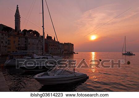 Stock Image - "Sunset over the sea, historic centre, Rovinj, Istria, Croatia, Europe". Fotosearch
